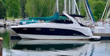 33' Chaparral 330 Signature 2004 port side at dock