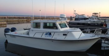 33' Parker 2530 Extended Cabin 2014 Port at Dock
